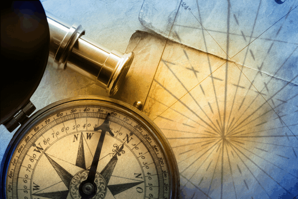 Image portraying a northstar, map, compass and telescope